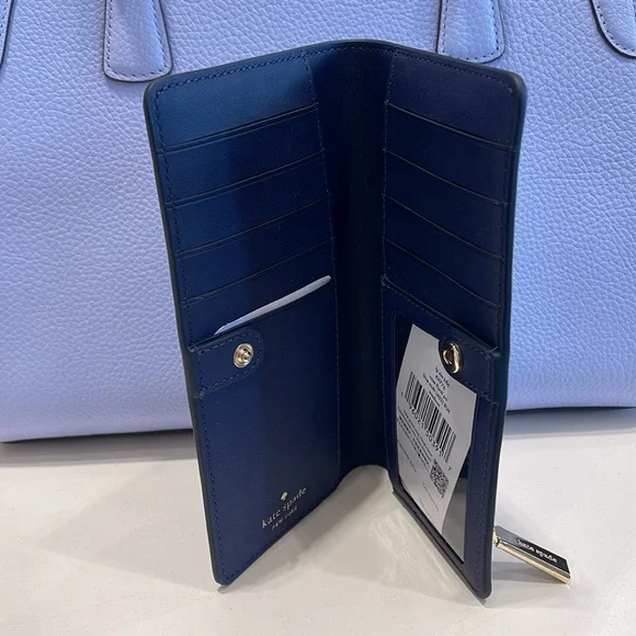 Kate Spade Madison Vase Floral Large Slim Bifold Wallet
Blue Multi
NWT - Picture 7 of 16